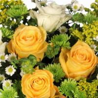 White & Yellow Roses · Arrangement
sweetheart vase, foliage: pittosporum, yellow roses, white roses, white monte ca...