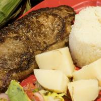 Churrasco Argentino · Grilled steak Argentine style, server with rice, boiled potatoes, and salad.