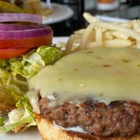 The Impossible Burger · Hardwood grilled, plant based patty, topped with pepper jack cheese, mustard, mayonnaise, le...