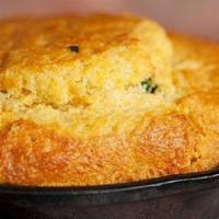 Iron Skillet Cornbread · Six (6) slices of fresh cornbread baked with buttermilk, creamed corn, jalapeno peppers, and...