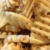 Waffle Fries · Crispy Crisscut Waffle Fries served Skin-On and tossed in our Signature Fry Rub