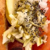 Chicago Dog · Quarter pound all beef frank seared to perfection and topped with dill pickle spear, green r...