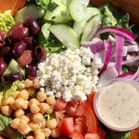 Mediterranean Salad · Romaine, cucumber, tomato, red onion, kalamata olives, garbanzo beans, feta, Greek dressing.