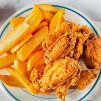 Chicken Wings  · 5 Golden Deep Fried Chicken wings, Honey BBQ wings or Hot wings. Served with fresh celery an...