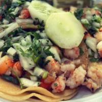 Shrimp Tacos · One soft tortilla taco, with shrimp, served with cilantro, onions, lemon and cucumber.