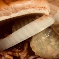 ½ Pound 1 Meat Sandwich · Choose a generous portion of one of our slow smoked meats on a buttery brioche bun add pickl...