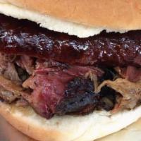 2 Meat Sandwich · Choose a generous portion of two of our slow smoked meats on a buttery brioche bun add pickl...