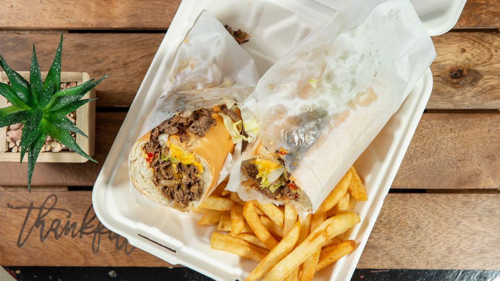 Cheese Steak · Served with lettuce, tomato, mayo, onions, hot and provolone or American cheese.