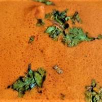 Chicken Tikka Masala · Cooked in a creamy sauce with the right blend of spices.