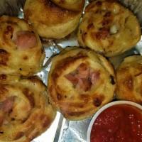 Chicken Bacon Ranch Rolls · Hand rolled bite sized fresh dough and cheese. served with toppings and marinara sauce.