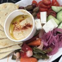 Hummus · Marinated olives, veggies, feta, pita bread