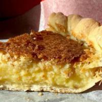Coconut Chess · Not your traditional Coconut Pie, our Coconut Chess mixes toasted coconut in a tangy vanilla...