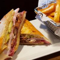 Best Original Cuban Sandwich · SMOKED HAM, PORK, SALAMI, SWISS CHEESE, 
DILL PICKLE SLICES AND SPICY MUSTARD, 
SERVED ON HO...