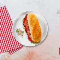 Ham Slam Sub · Ham, salami, provolone cheese, lettuce, and tomato served on a hero roll.