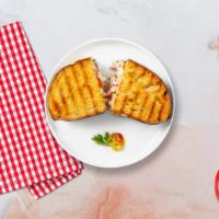 Talkin' Tuna Melt Panini · Tuna and melted cheese on your choice of toasted bread.