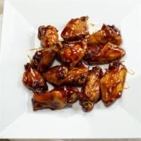 Chicken Wings With Sauce ( 10 Pcs) · Cooked wing of a chicken coated in sauce or seasoning.