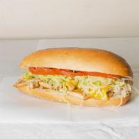 Grilled Chicken Sandwich · Grilled chicken breast, cheese, lettuce, tomatoes, red onions, mayo.