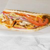 Grilled Chicken Panini · Grilled chicken breast, American cheese, lettuce, tomatoes, onions, mayo.