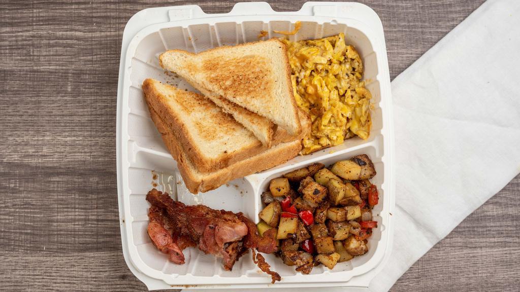 Breakfast Platter · 2 eggs, 2 bacons, potatoes and toast.