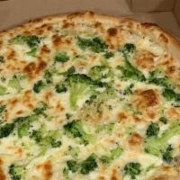 Our Pasta White Pizza · First of creamy layer of alfredo sauce topped with pasta, chicken, Italian sausage, and gree...