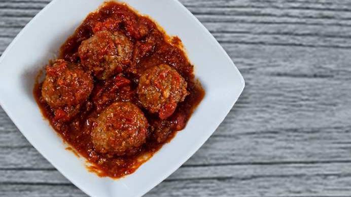 Meatballs · 4 meatballs with sauce.