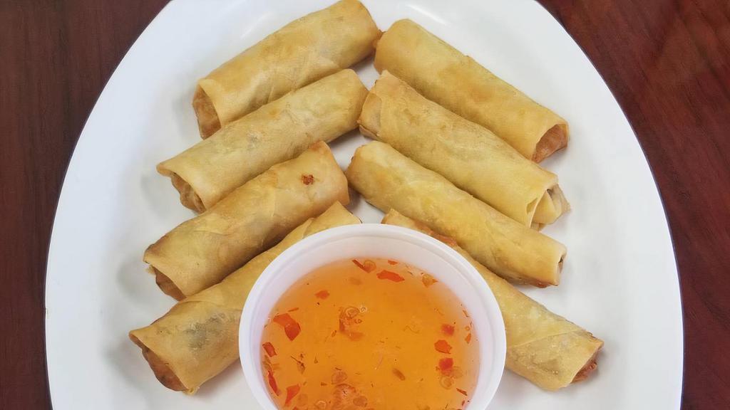 Spring Rolls (8) · Roll of chicken mixed with glass noodle and vegetables.