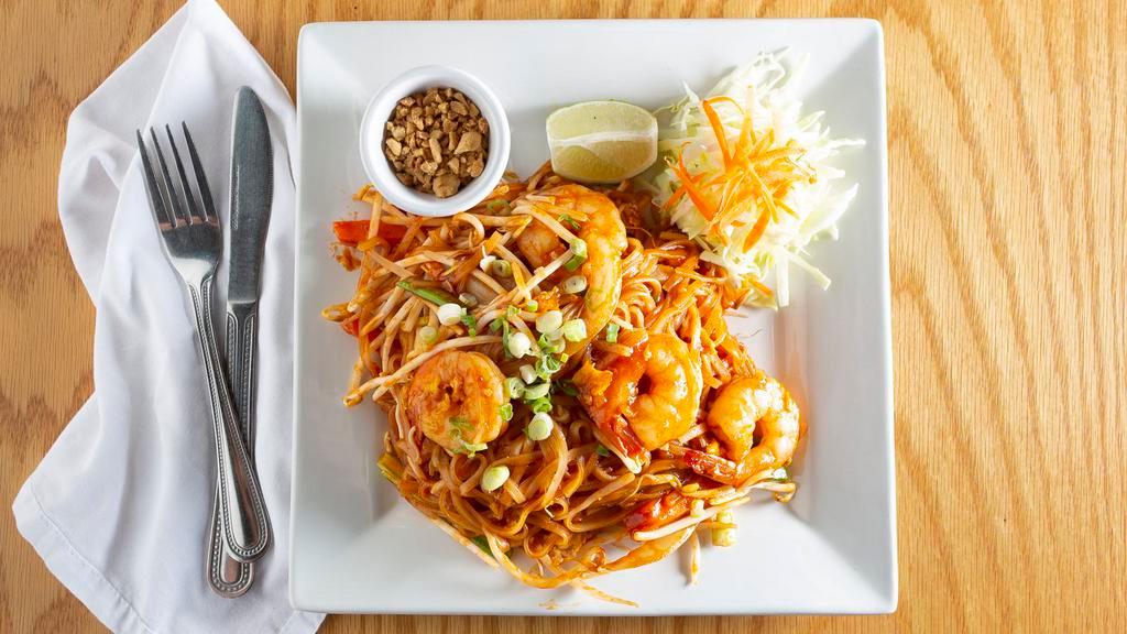 Pad Thai · Stir fried rice noodles,  egg, bean sprouts, onion, peanut and limes.