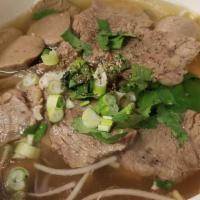 Kuey Teow Nueah (Thai Pho) · Thai noodles soup with tender beef, meat balls and veggies.