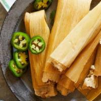 Jalapeno Pork Dozen · These tamales are just right for those who enjoy a little spice in their life. The tamales a...