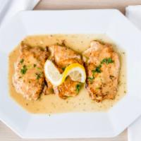 Chicken Française · Sliced chicken breast dipped in egg and sautéed in lemon butter and white wine sauce.
