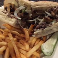 Loaded Steak Sandwich · Grilled 8 oz. Sirloin topped with American cheese, mushrooms, onions and peppers served on a...