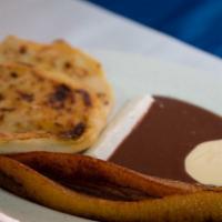 #5 · choose 2 of your favorite pupusa comes with fried plantain,beans,cheese,salvadorian sour cre...