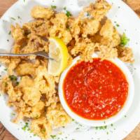 Fried Calamari · Choice of marinara or chipotle sauce.