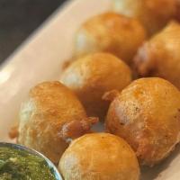 Goat Cheese Balls · Fried goat cheese with chimichurri sauce