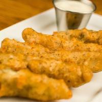Fried Pickle Spears · Amber ale battered dill pickles with ranch sauce