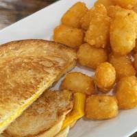 Kids Grilled Cheese · Texas toast & american cheese grilled golden brown