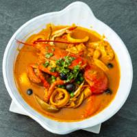 Cazuela De Mariscos · Lobster tail, shrimp, calamari, mussels and clams in creole sauce.