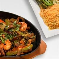 Fajitas Mixtas · Your choice of meat sautéed with onions, bell peppers, tomatos and mushrooms.