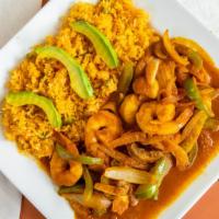 Camarones Ala Diabla · Prawns with mushrooms, onions, and green bell peppers in a spicy sauce. Served with rice.
