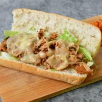 Chicken Cheese Steak Sub · Onions, peppers and mushrooms.