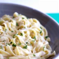 Fettuccine Alfredo Pasta  · Our Secret recipe Alfredo  Sauce,  With Freshly Made Fettuccine  And Topped Off With  Parmes...