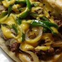 Philly Cheesesteak Sub · just like the name, sirloin steak meat,  sauteed green peppers, mushrooms and onions. topped...