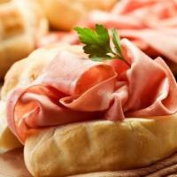Mortadella · Fresh Thinly Cut Slices of our Famous  Mortadella . A must Have in our Charles Village area.