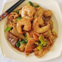 Triple Delight · Shrimp, chicken and beef sautéed with mixed vegetables.