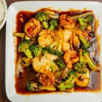 Garlic Seafood Combo · Jumbo shrimp & scallops sauteed w vegie in hot garlic sauce