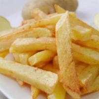 Fries · Idaho potatoes fried until golden crisp - garnished with sea salt. served with ketchup.