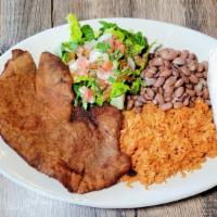 Milanesa Plate · Breaded steak. Served with rice, beans, salad and tortillas.