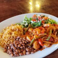 Camarones Rancheros · Shrimp sauteed in butter with mild ranchero sauce, onions and bell peppers