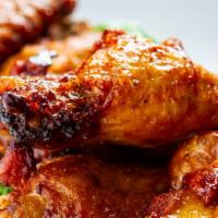 Jumbo Chicken Wings · Buffalo, honey old bay, or chili BBQ.