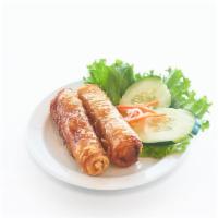 Chả Gio · Crispy spring rolls (2 rolls). Two crispy spring rolls made with pork and shrimp, served wit...